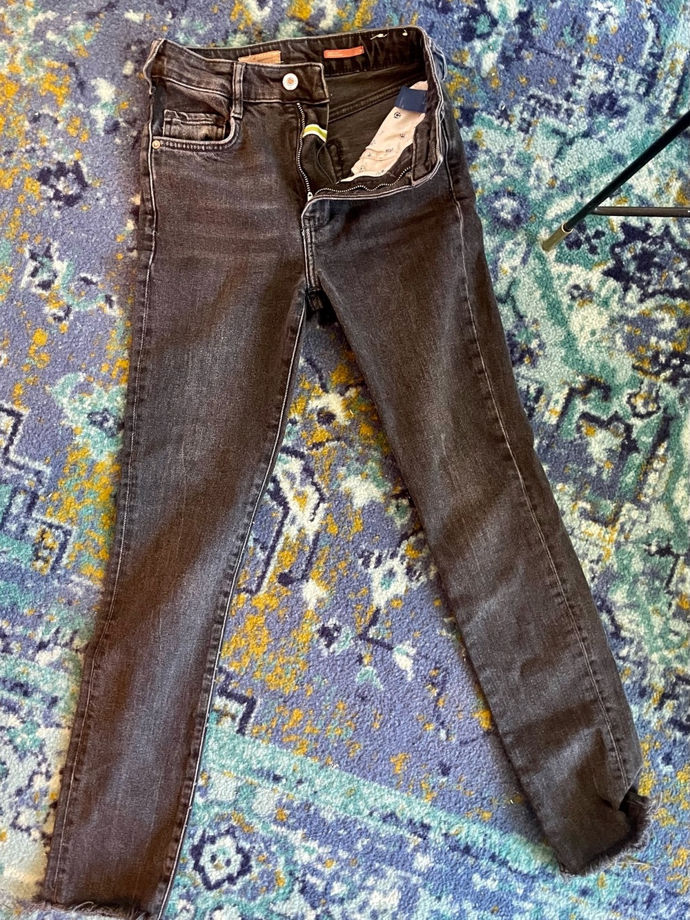Pilcro & The Letterpress black "The Cigarette" jeans w/ raw hem
